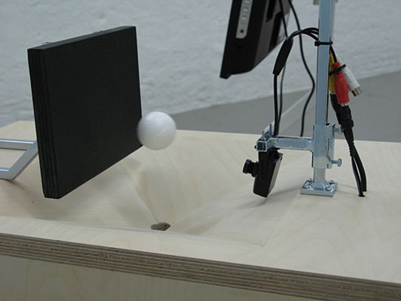 camera-based works — Måne uden navn (Moon with no name) (1), 2008, Camera, iron, fan, screen , Variable dimensions (approx. 200 x 150 x 150 cm), (detail)