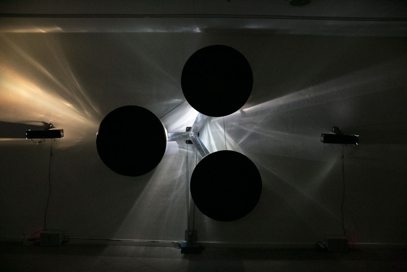 Installation — Dark Matter, 2018, Mill, straps, power supply, lamps, metal and wood, 210 x 350 x 40 cm., Created in collaboration with Morten Skriver and Clive Ellegaard.